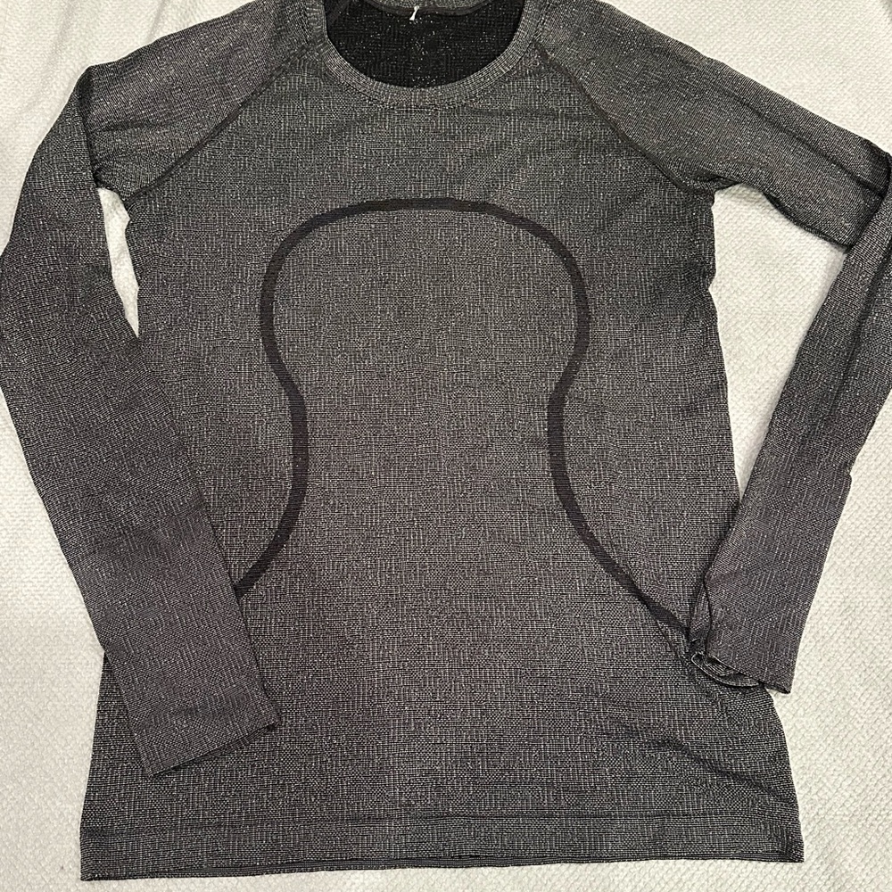 Lululemon Swiftly Shine, sz 10